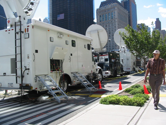 Rows and rows of media trucks