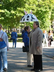 Tourists with a funny umbrella